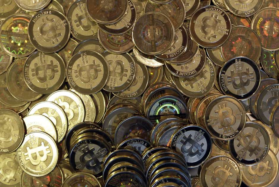 China's bitcoin mining might cost it its carbon neutrality. (AP Photo/Rick Bowmer)
