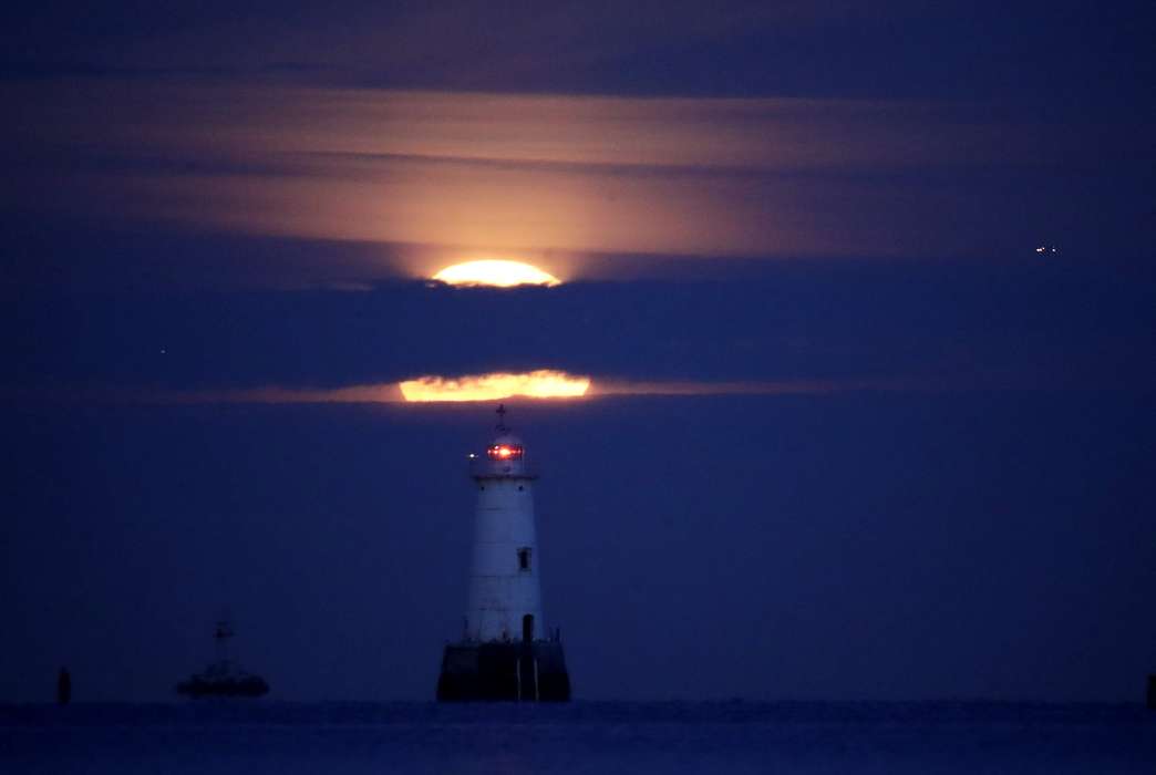 Lighthouses have helped ships navigate for centuries. Now acoustic ones might help birds avoid hazards. (AP Photo/Julio Cortez)