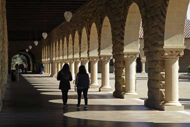 Students walk on the Stanford University campus in Santa Clara, California. (AP Photo/Ben Margot)