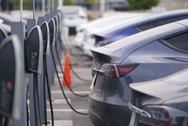 Electric vehicles charge outside a dealership in Colorado. Researchers at Carnegie Mellon University have developed a new software that may now make finding a charging station much easier. (AP Photo/David Zalubowski)