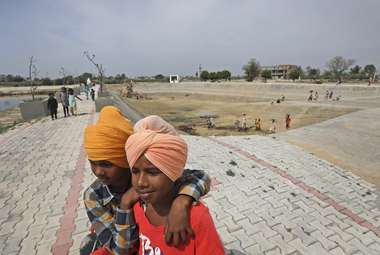 Children play in the Ranish Kalan village in India. (AP Photo/Manish Swarup)