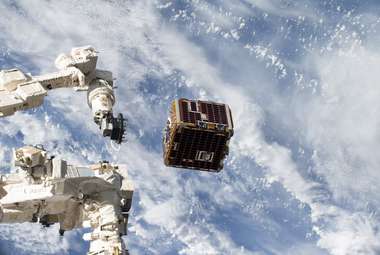 Robotic arms are the best method to collect human-made space debris. The NanoRacks-Remove Debris Satellite, above, was launched in 2018 from the International Space Station. (NASA/JSC/Drew Feustel)